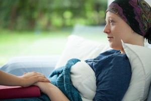 Female Cancer Patient in Bed
