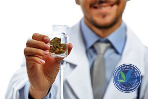 Doctor holding a glass jar of cannabis