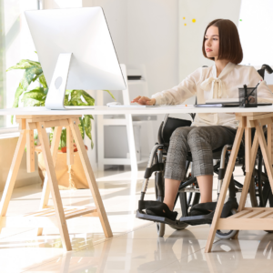 Woman with disability working at a desk